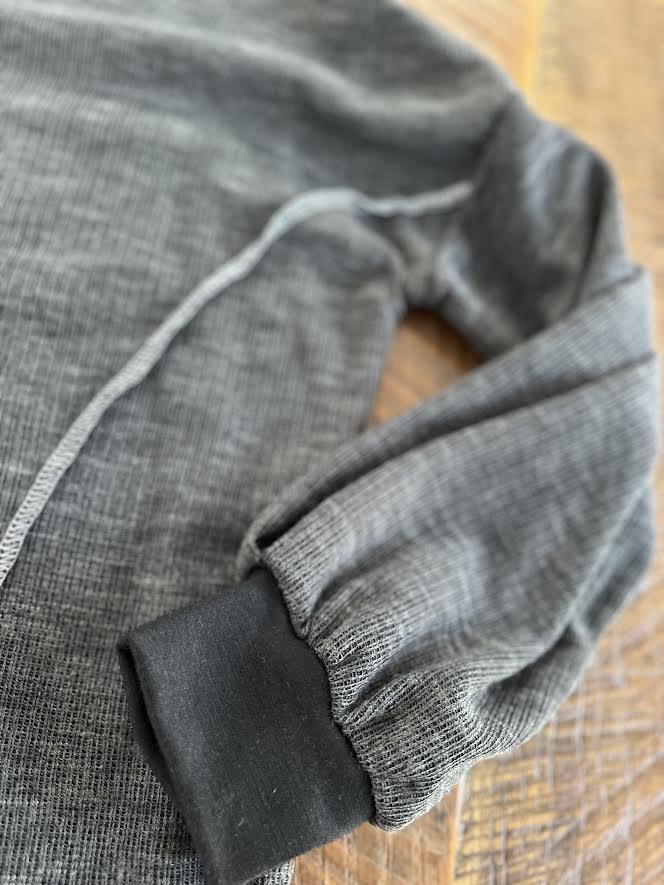 V Neck Exposed Seam Black Top