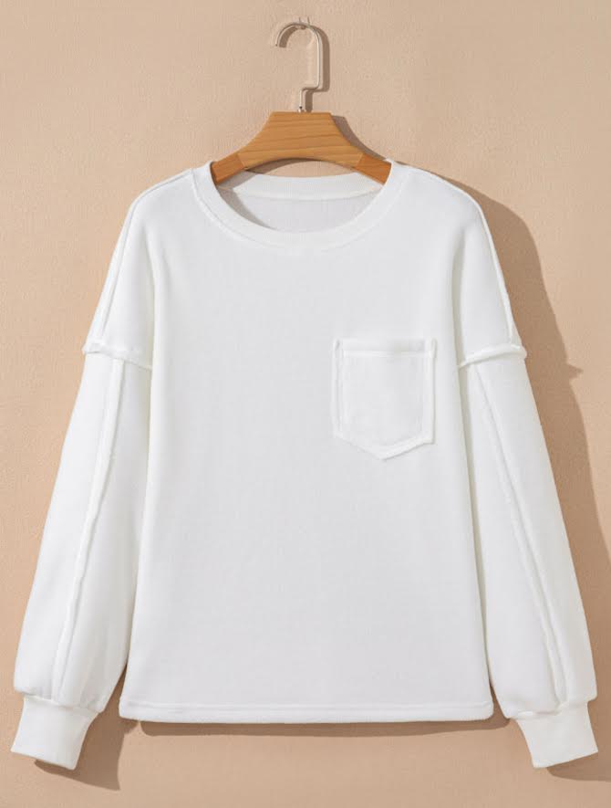 White exposed seam sweatshirt